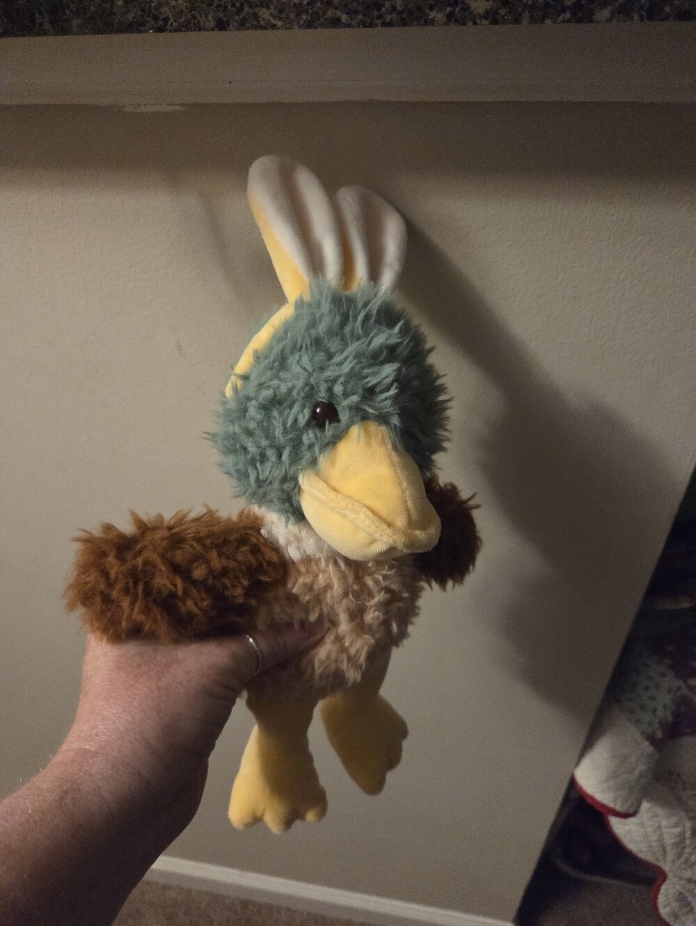 Adorable duck with bunny ears stuffed animal toy